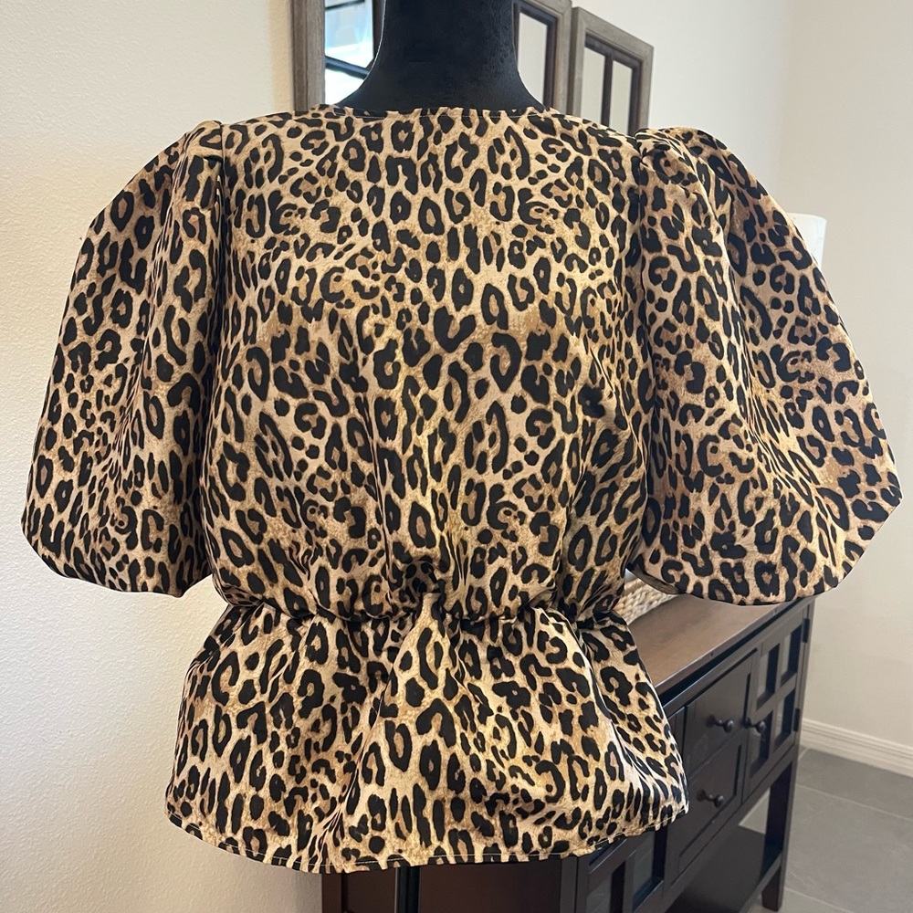 Medium H&M animal print Peplum top